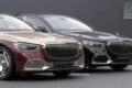 Two Mercedes-Maybach S-Class 1:18 models side by side, Kalahari Gold/Rubellite Red and black