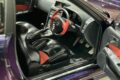 Nissan Skyline GT-R R34 Z-Tune 1:18 model interior with black and red seats and steering wheel