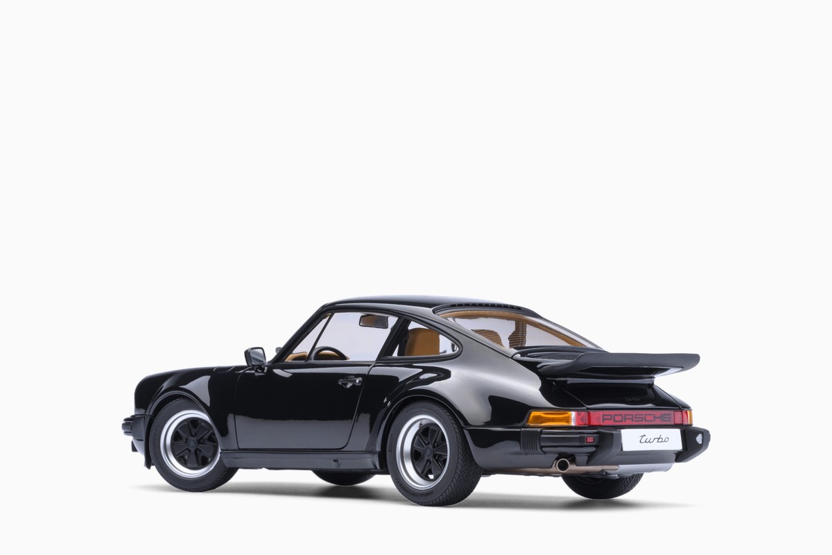 AUTOart 1/18 Porsche 911 (930) Turbo 3.0 in Black, rear three-quarter view