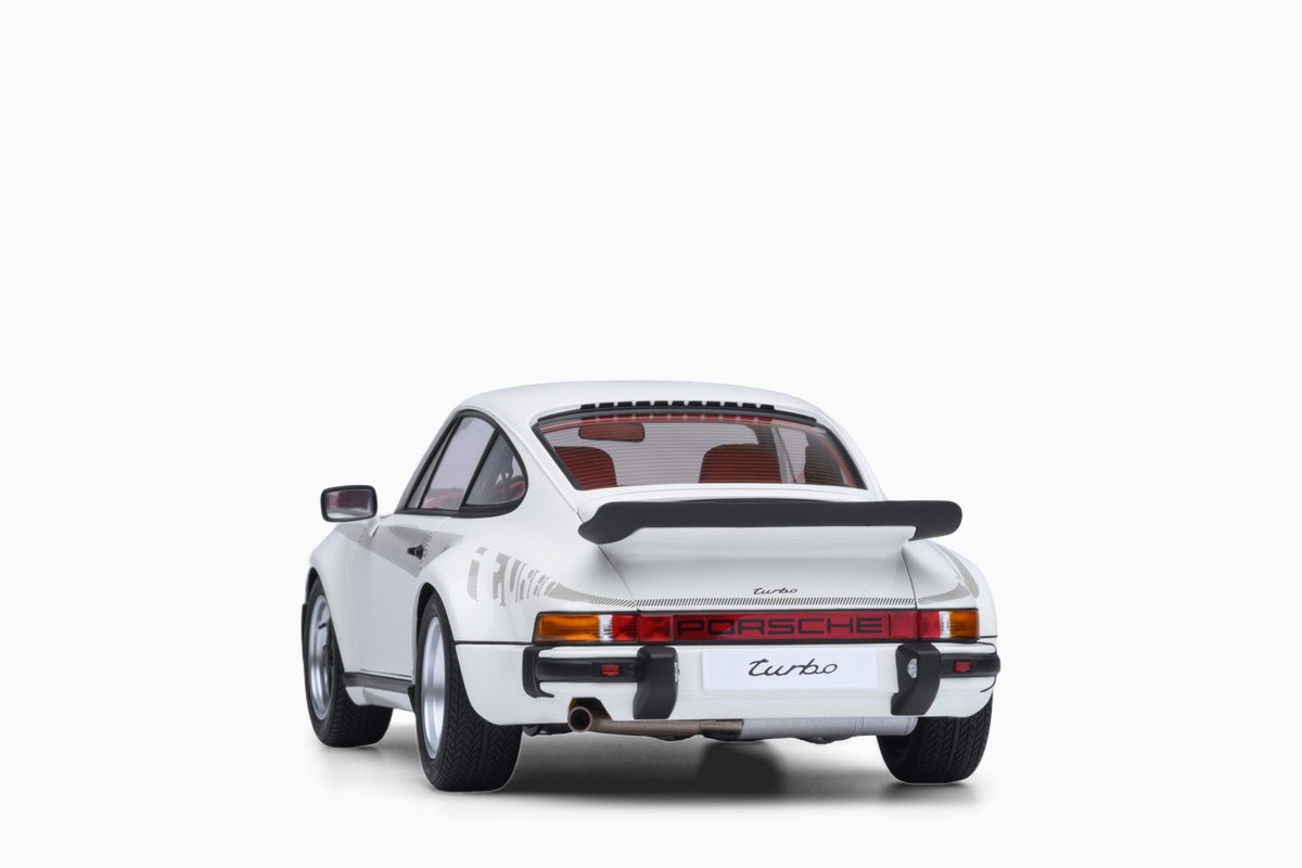 AUTOart 1/18 Porsche 911 (930) Turbo 3.0 in Grand Prix White w/Turbo Stripes, rear view